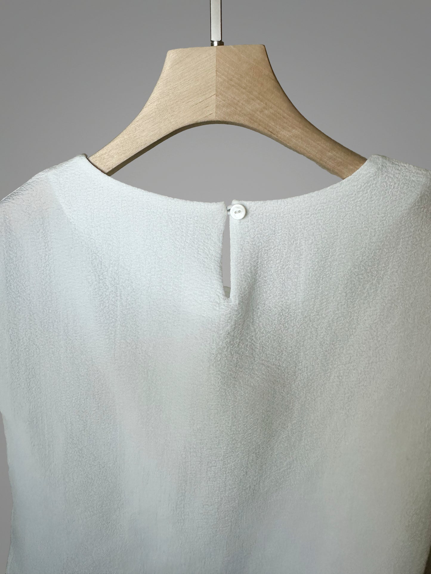 Asymmetric Twist Detail Top